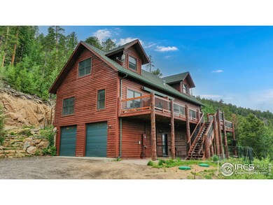 Oversized 2 stall garage with painted drywall and heat