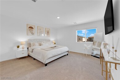 Bedroom featuring baseboards, carpet flooring, and