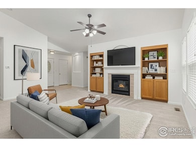 Living room with gas fireplace and built-ins