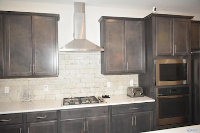 Gas Stove, Great Countertops.....Huge Island