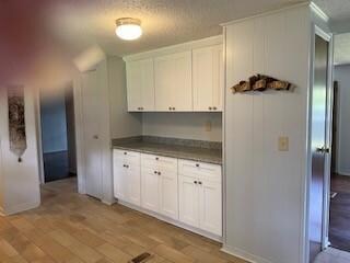 NEW KITCHEN SHOWING COAT CLOSET & PANTRY