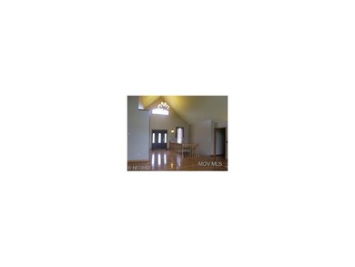 features Vaulted Ceilings...