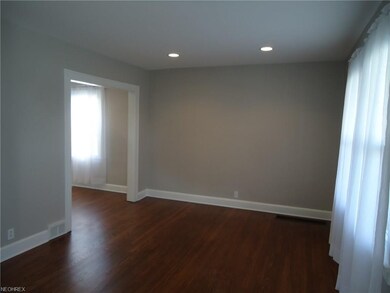 Living Room With Refinished Hardwood Floors