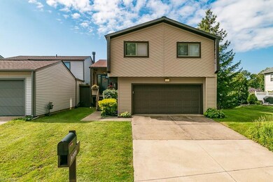 View of front of property featuring garage and a f