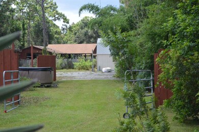 Side of home, entrance to pad