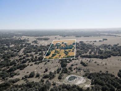 Overview of rural landscape featuring property parcel outlined