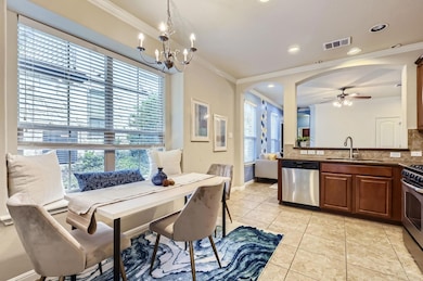 Dining area featuring visible vents, ornamental m