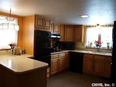 Kitchen. Large, updated country kitchen has mornin