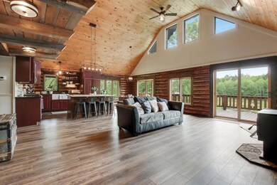 Large windows & deck to enjoy views of the creek and beyond
