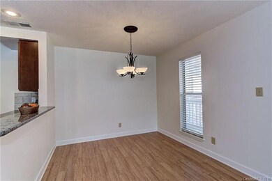 Dining area with kitchen bar seats 3 comfortably