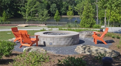 View of patio featuring an outdoor fire pit