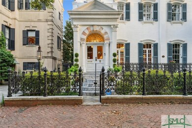 Ornate front stoop with bespoke detail
