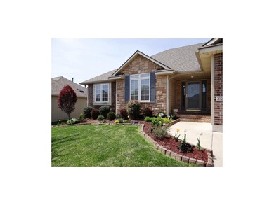 Front Mullioned Windows & Beautiful Landscaping