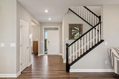 (Photo of a decorated model, actual homes finishes will vary) Make the best first impression with this bright and open foyer!