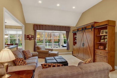 Living Room with custom vaulted ceiling and views 