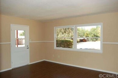 The freshly painted living room.  Isn't the chair 