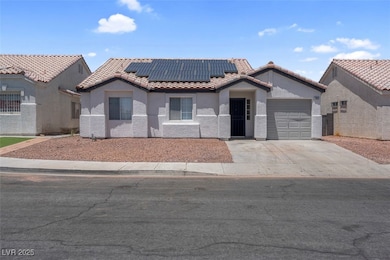 View of front of property featuring a tiled roof,