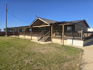 View of front facade featuring fence, a deck, a fr