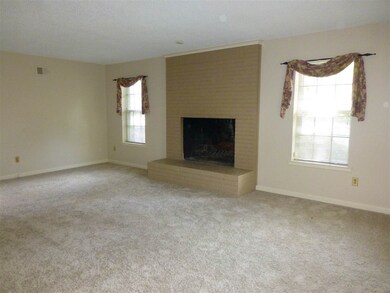 The living room is extra spacious and has a REAL f