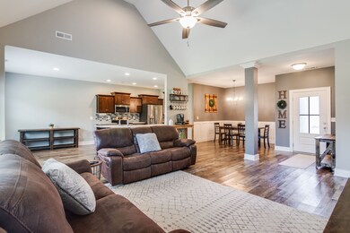 Open floor plan with dining space and an eat in kitchen.