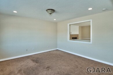 This 2,016 square-foot home also offers three livi