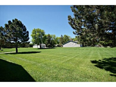 Townhome sits next to a large, open green space!