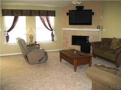 LARGE GREATROOM WITH GAS LOG FIREPLACE IN THE CORNER