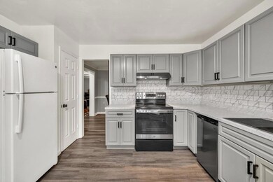 Kitchen with appliances with stainless steel finis