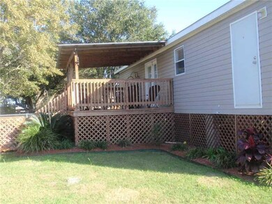 Exterior Back. 12 x 15 covered deck