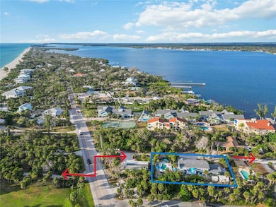 Steps to the deeded beach access on the Gulf and deeded dock and kayak access on the bay