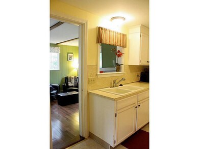 Kitchen. Looking toward den with...