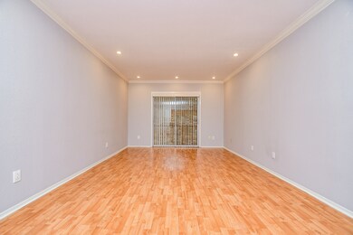 The living area features sliding doors that open t