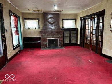 Huge 15'x27' Great room featuring a brick fireplace.