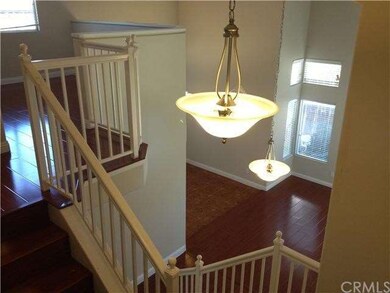 View of Loft and Living Room. Note the Upgraded Li