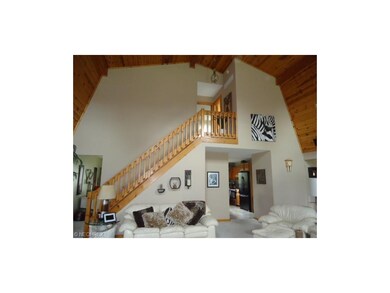 Spacious Great Room showing staircase to the secon