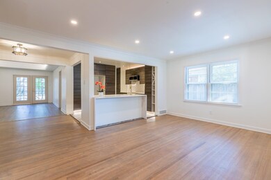 Kitchen featuring ornamental molding, french doors