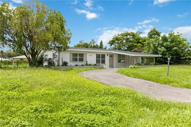 Single story home featuring a front yard