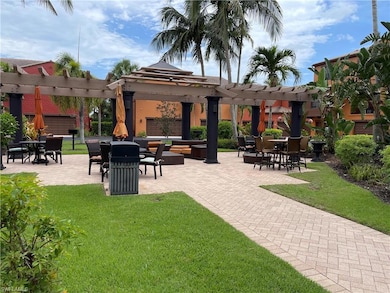 Surrounding community featuring a pergola, a yard, and a patio