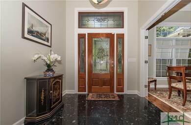 entranceway from inside shows the elegant door and