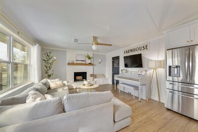 Don't miss the cozy wood burning fireplace with bu