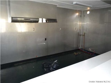 Kitchen area in home. Gas hook up. Was once used f