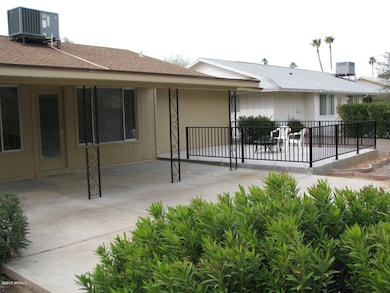 Covered Patio with Slab and Rod Iron