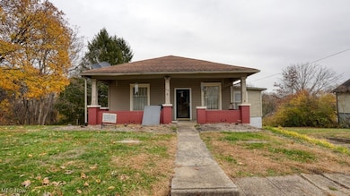 818 Highland Ave, Cambridge, OH 43725 - photo 5