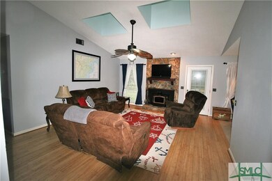 High ceilings with two skylights in the family roo