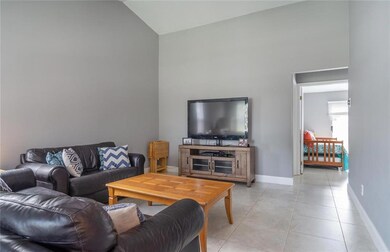 Vaulted ceilings gives this great room a light and