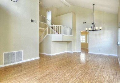 Living and Dining room areas. All chandeliers are 