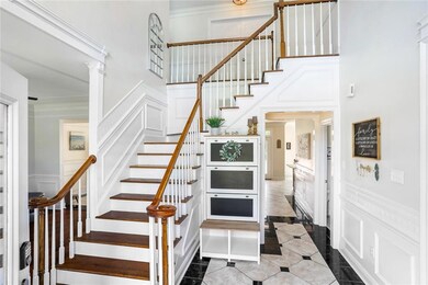 Grand staircase looking in to the hall that leads