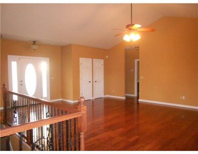 Living Room. paneled recesssed entry, double stora