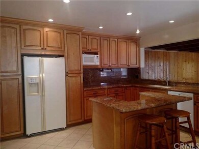 Upgraded kitchen cabinets with pullouts and center
