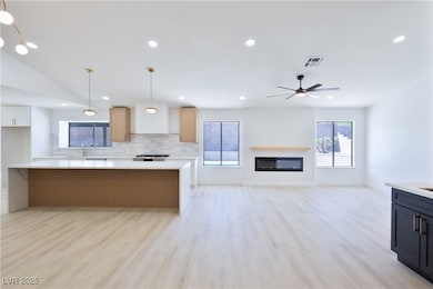 Kitchen featuring light wood-type flooring, light
